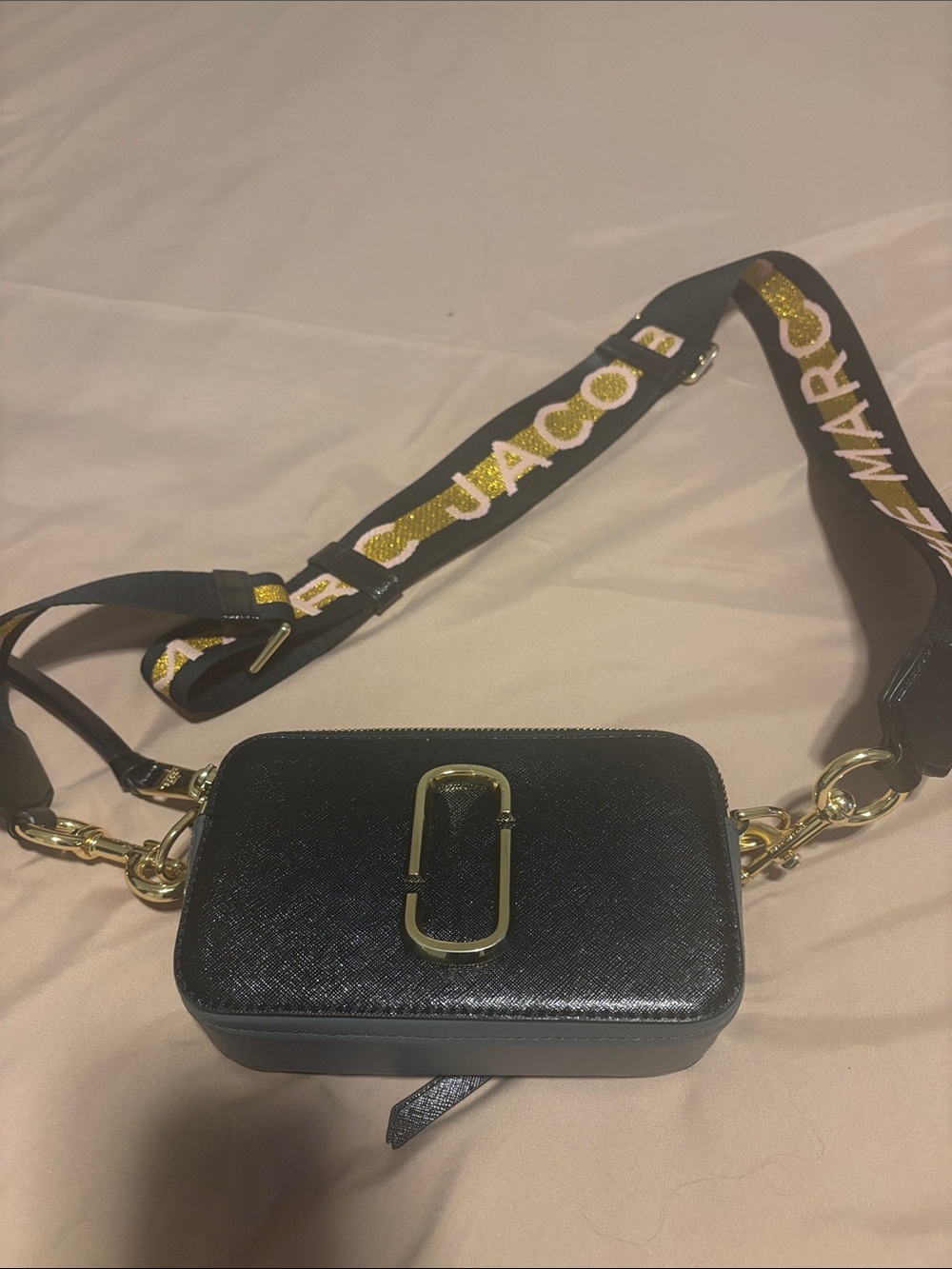 Marc Jacobs Black Crossbody snapshot bag with Gold Hardware and Branded Strap